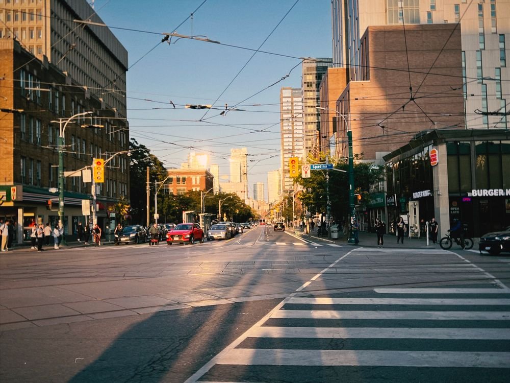 Toronto tram street intersection at sunset - ORM for Toronto Bay Street professionals